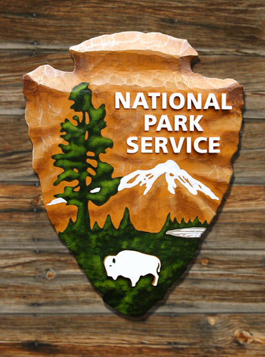G16023 - Carved Wood Emblem of the National Park service, the "Arrow"