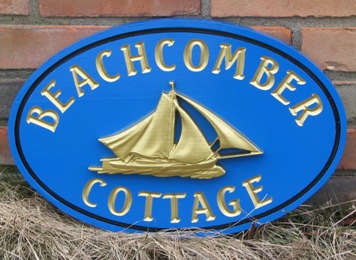 L21007 - Gold-Leaf Gilded Sailboat on a Beach Front Cottage