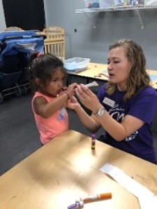 Educator working with child