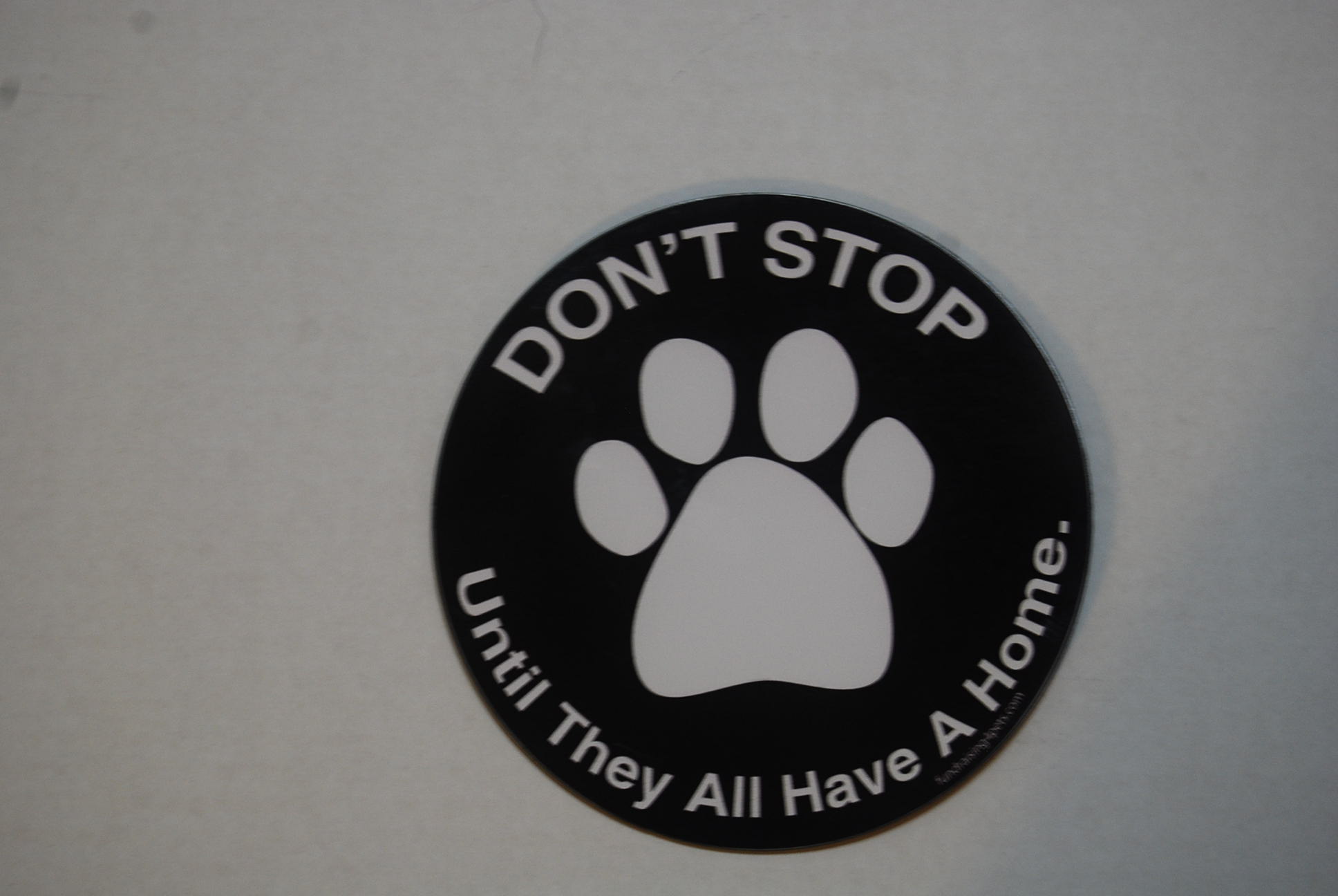Don't stop until they all have a home magnet (paw style) - $5.00