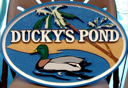 M1003 - Carved Duck on Pond Sign