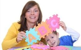 Childcare Provider Teaching Child