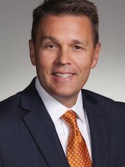 Justin Brown – Trustee