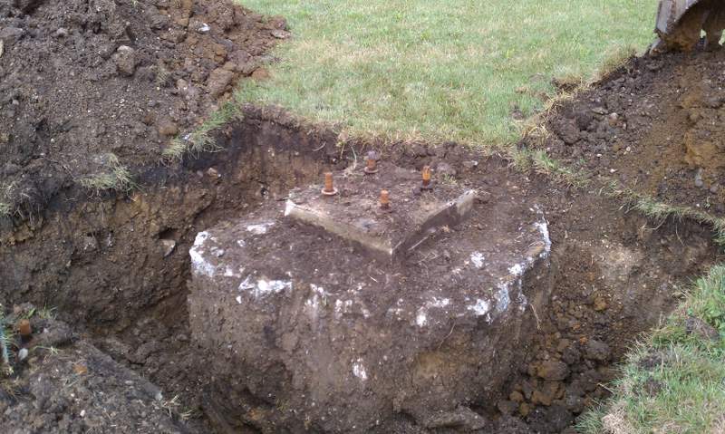 shot of pylon sign footing removal
