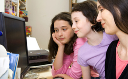 Mom with Girls at computer