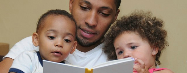 Dad Reading to Toddlers
