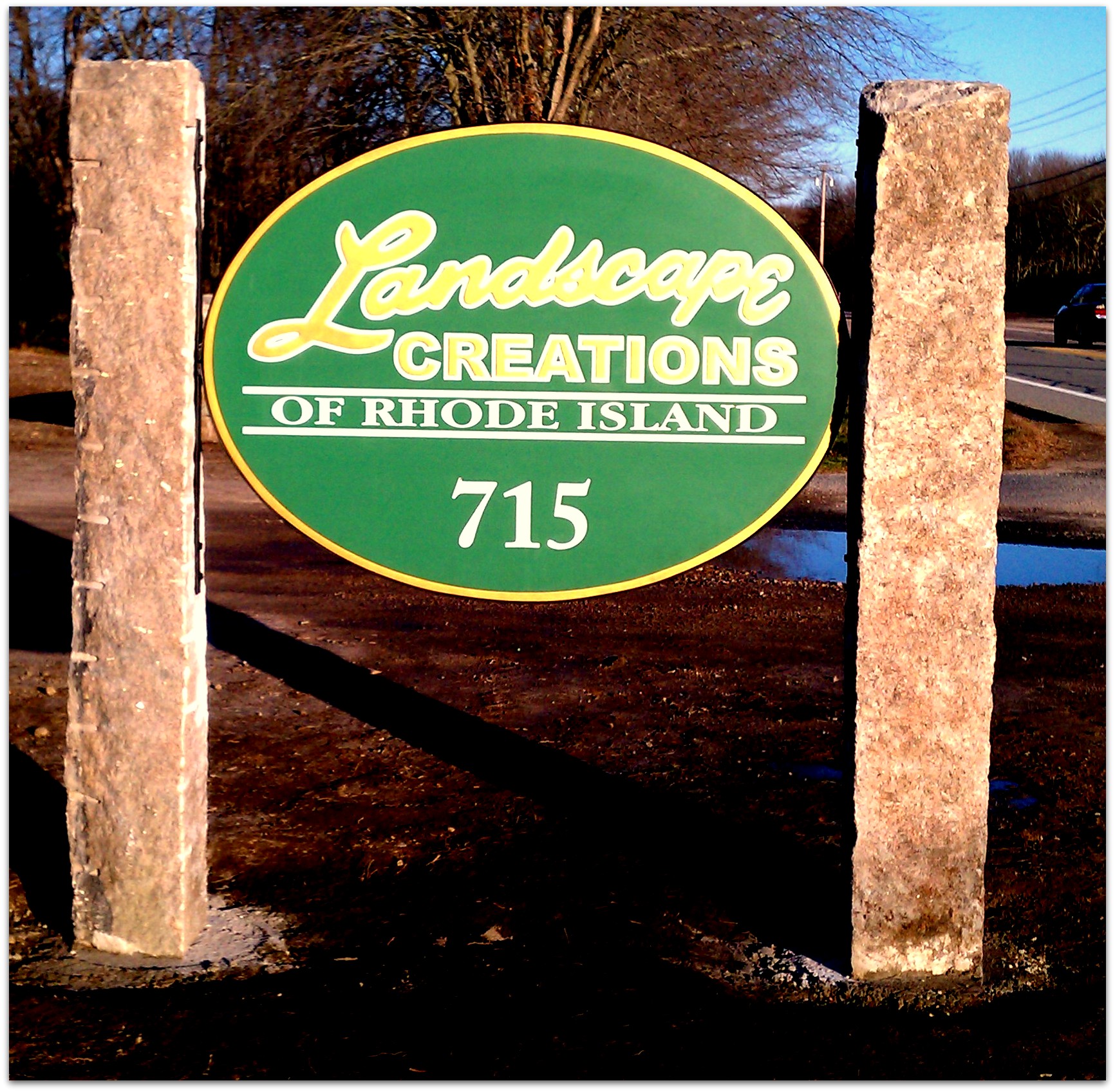 S28027 - Entrance Sign to Landscaping Company, Wood Sign with Stone Pillars
