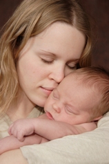 Girl Holding Baby