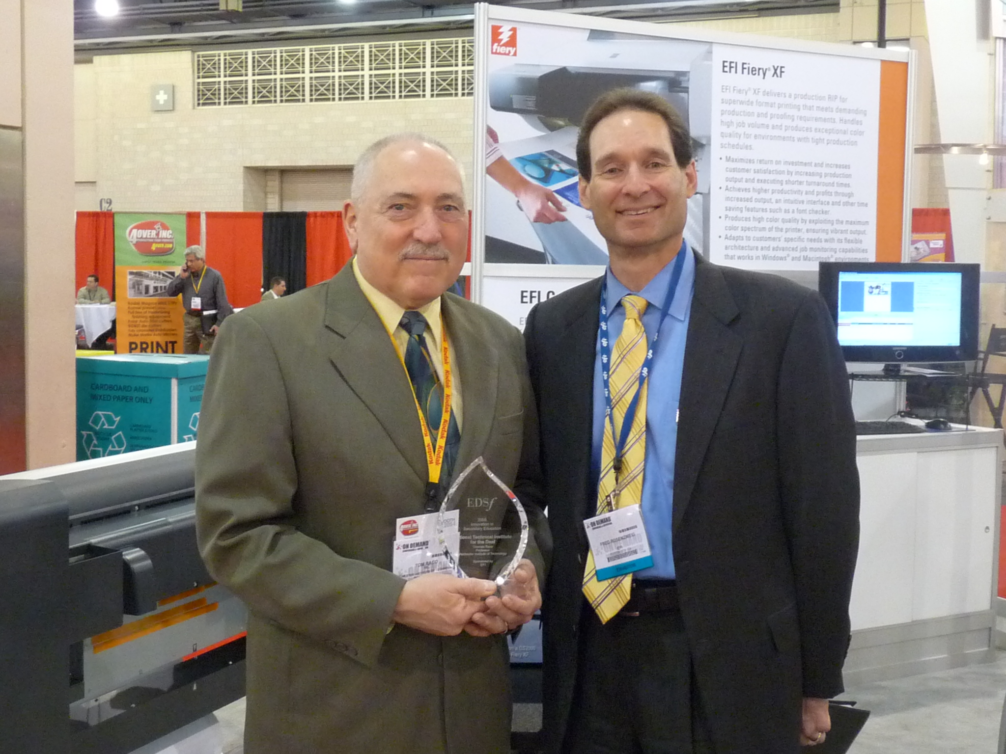 Thomas Raco, RIT, accepts the 2009 Innovation in Secondary Education Award from Fred Rosenzweig, EFI