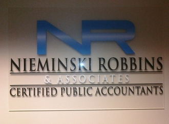 NR & Associate acrylic sign