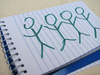 Notepad with stick figures