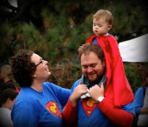 A family dressed as super heroes from a past Buddy Walk.