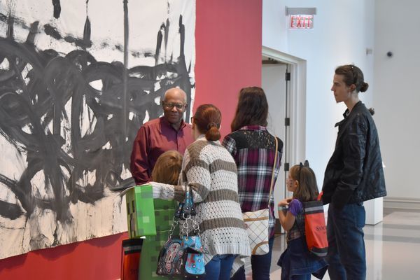 Harry Lindsey, who has been a docent at The Columbus Museum since 2014, gives a tour that includes "Hair Painting No. 29" by Jarrett Key in this 2018 photo.