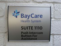 ADA Suite Sign