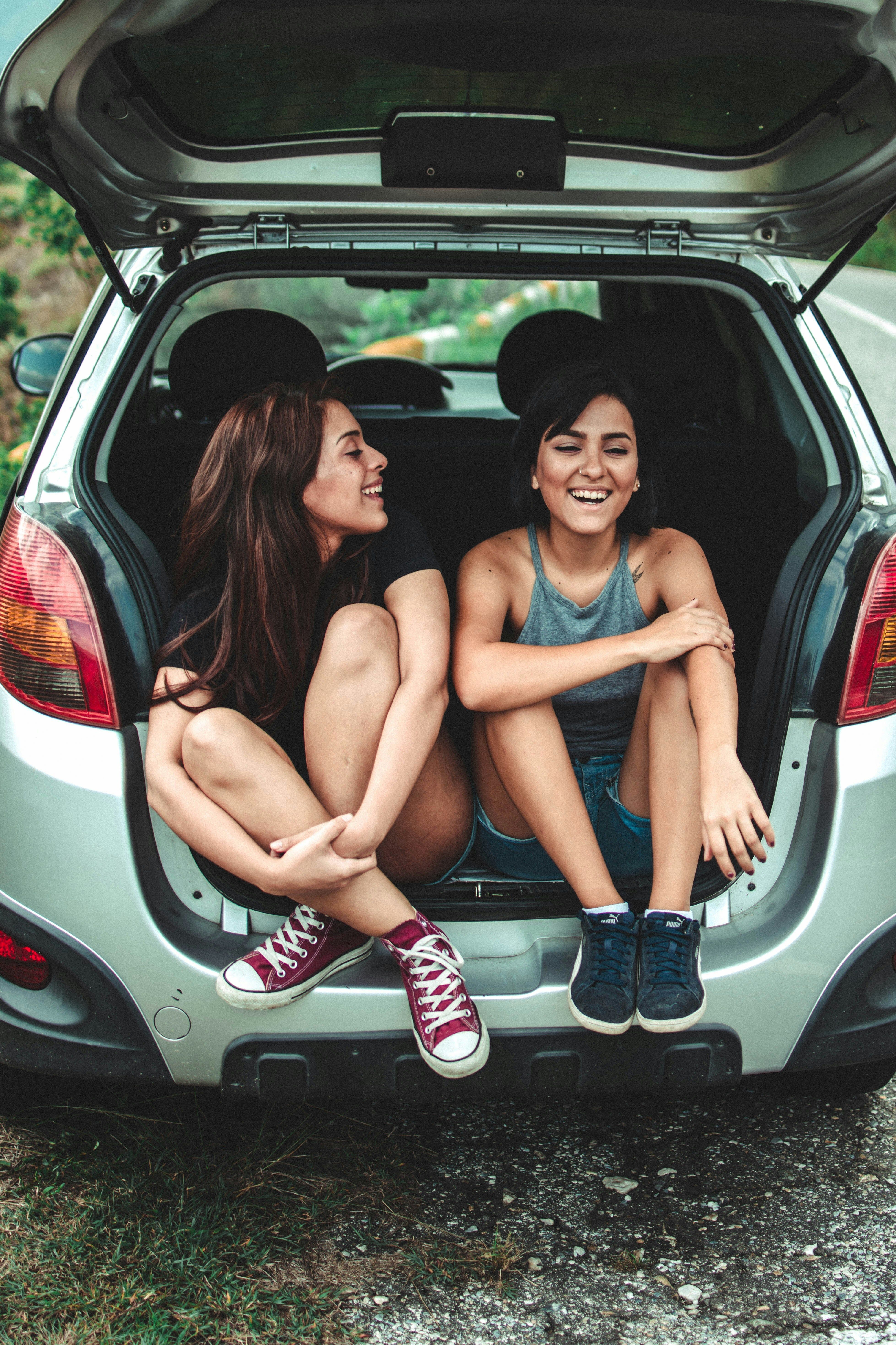 Two women sitting in car