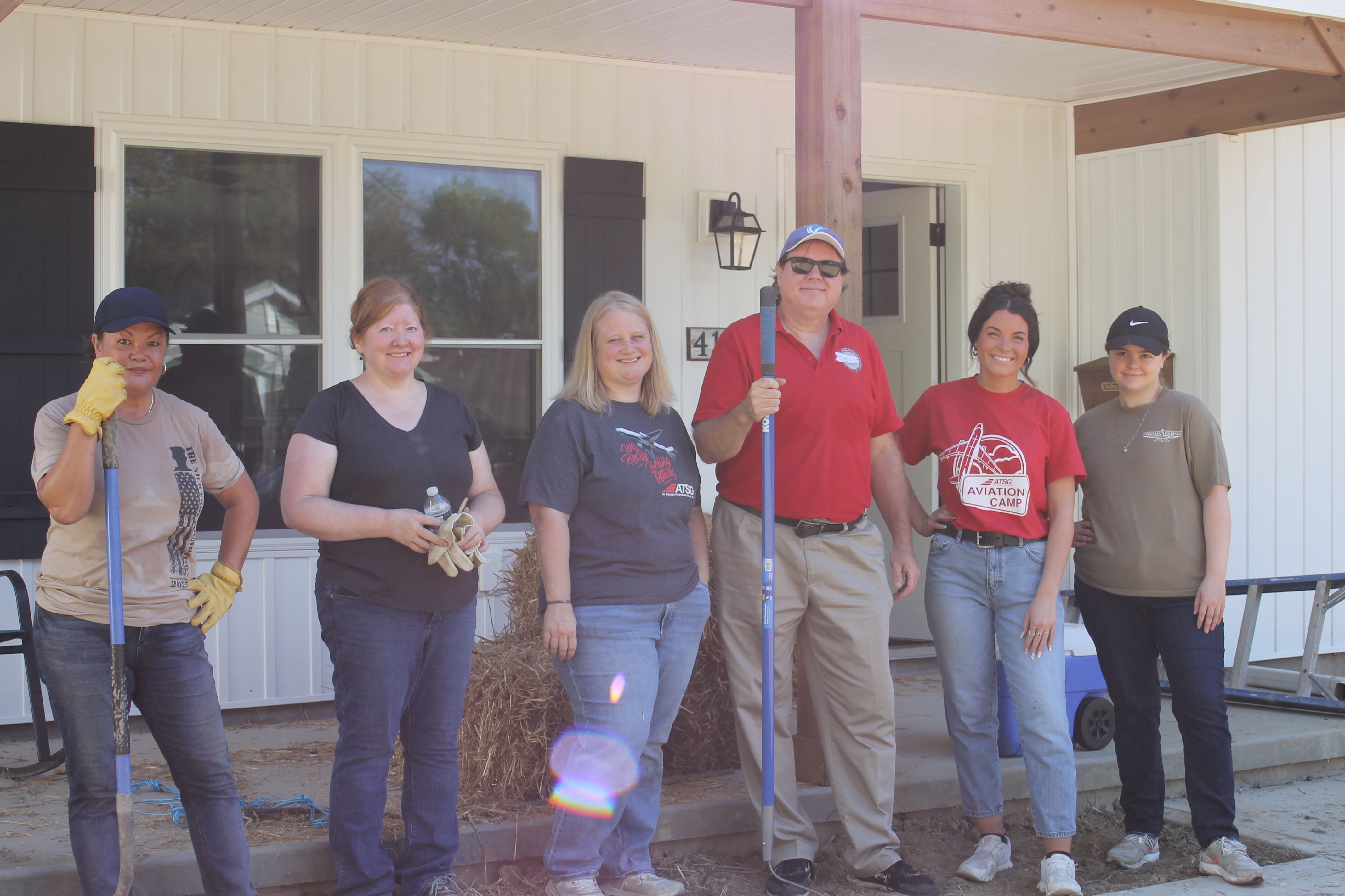 Our Friends from ATSG Put Down Seed and Straw on Mulberry St.