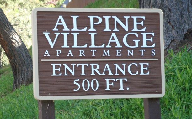 KA20595 - Carved Wood Grain HDU Sign for Apartment Entrance, "Alpine Village Apartments Entrance 500 Feet"