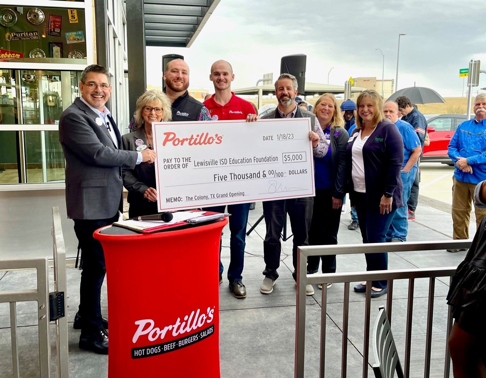 Portillo's in The Colony Presents LEF with $5K Check at Grand Opening