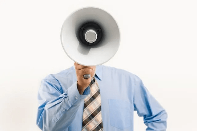 person holding megaphone