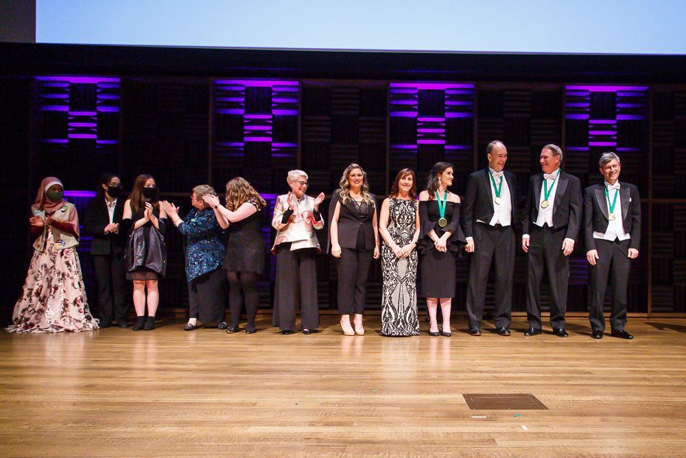 All of the FVF award recipients, along with the Cleveland girl scouts, stand on stage at the film premier.