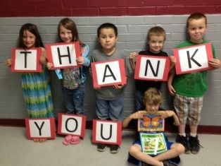 Students with TY sign