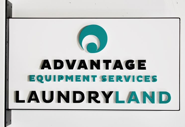 S28179 - Carved Sign  for  Advantage Equipment Services Laundryland, with Steel Perimeter frame and Side Bracket for Wall Installation