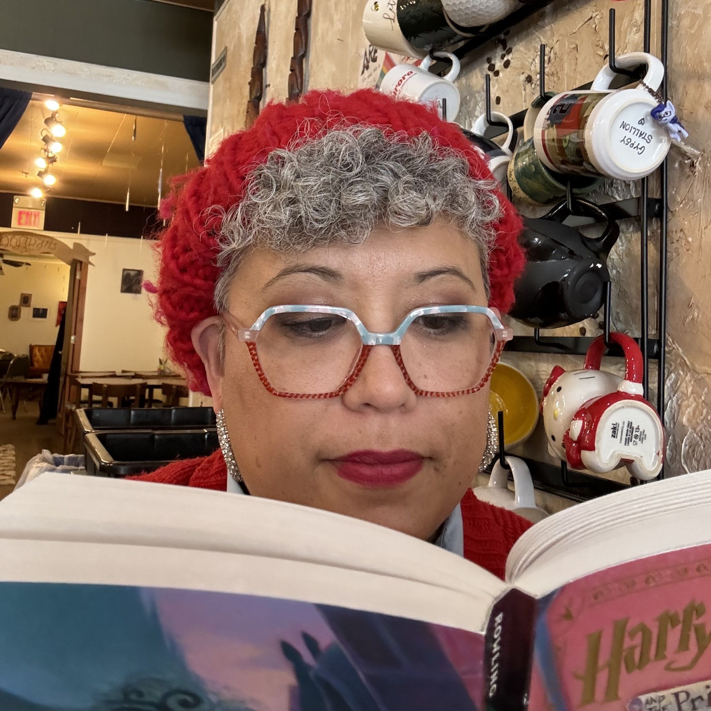 Maile reading Harry Potter and the Prisoner of Azkaban.