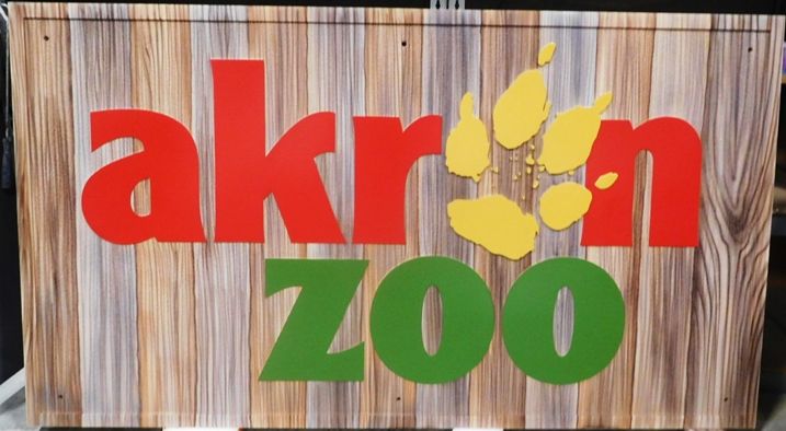 GA16495 - Large Carved High-Density-Urethane (HDU)  Sign  for Akron Zoo, with Lion Paw Print as Artwork.