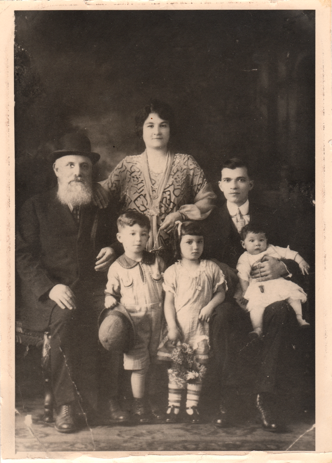 Grandfather Yosef, mother Dona, father Judah, brother Sam, Becky, and sister Nellie.