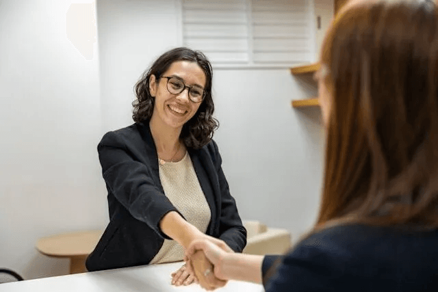 Shaking hands at a job interview