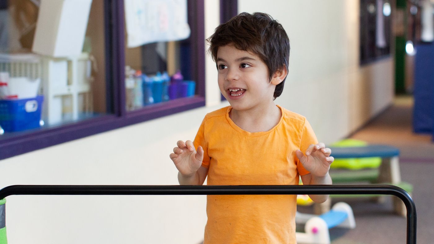 Boy enjoying jumping on the mini trampoline