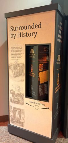 Exhibit display case and panel titled a "A Vision of the New Museum."