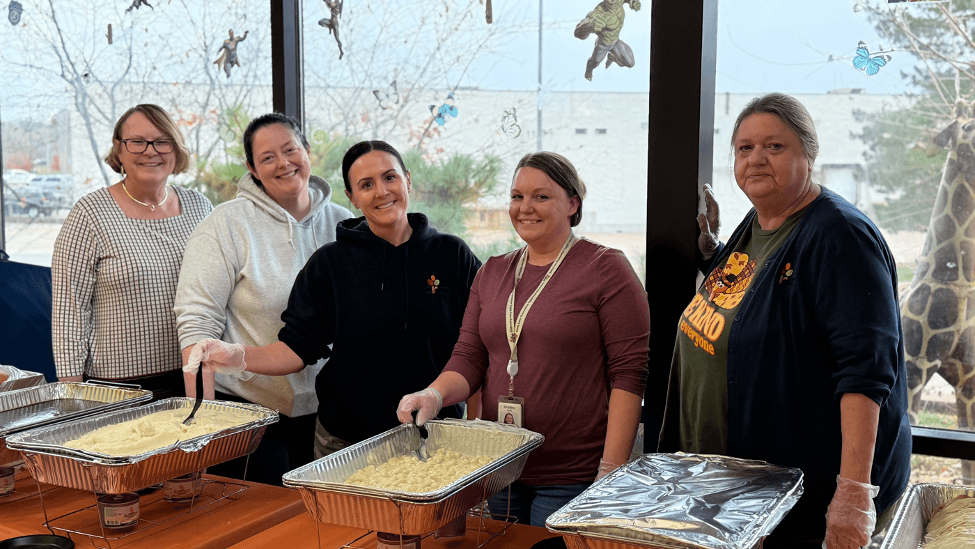 Staff volunteers serving at the Thanksgiving luncheon