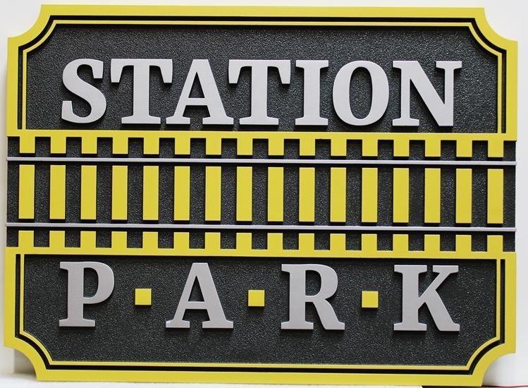 K20419 - Carved HDU  Entrance Sign for the Station Park Residential Community, with Railroad Tracks as Artwork