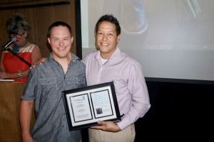 Brendan presents Steve Phua, CEO from Wonderland Homes, with a gift of IN!'s appreciation! 
