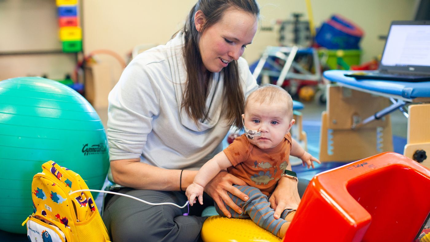 Physical Therapist working with an infant client