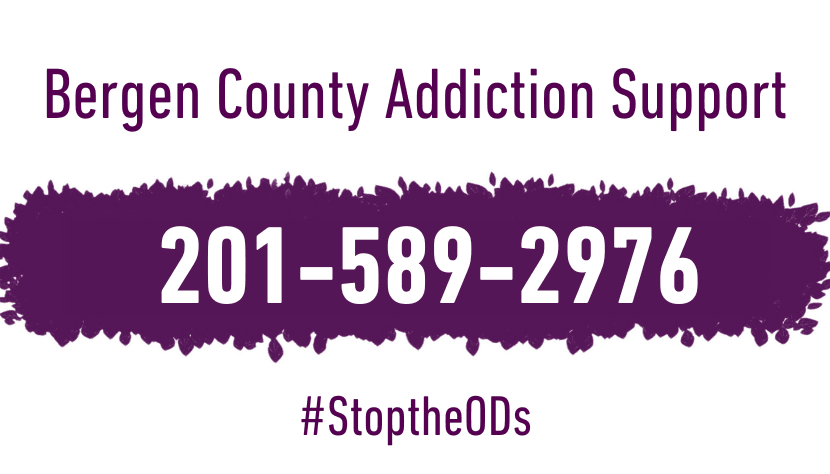 banner with the 24/7 hotline phone number on it 201-589-2976