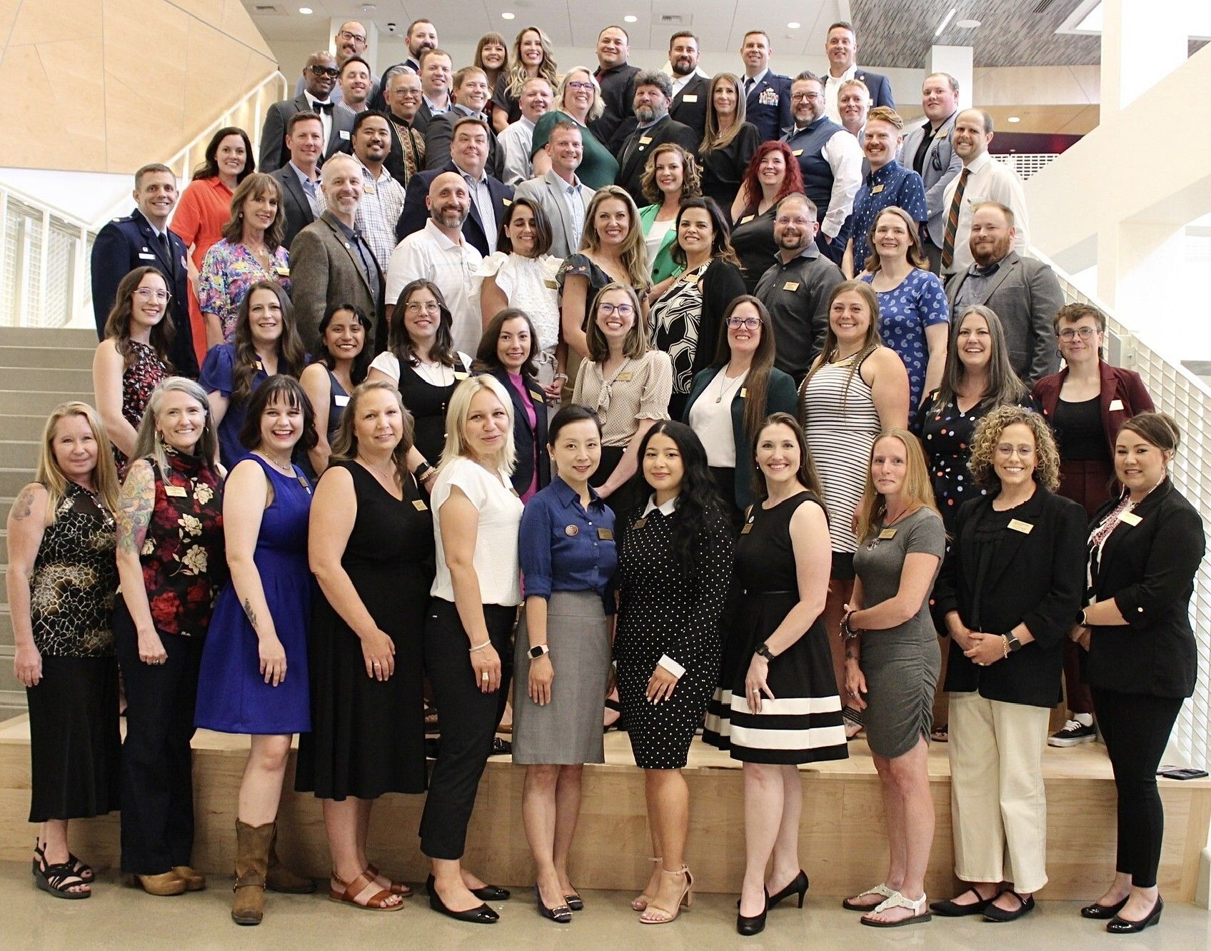 A large group of people pose for a photo