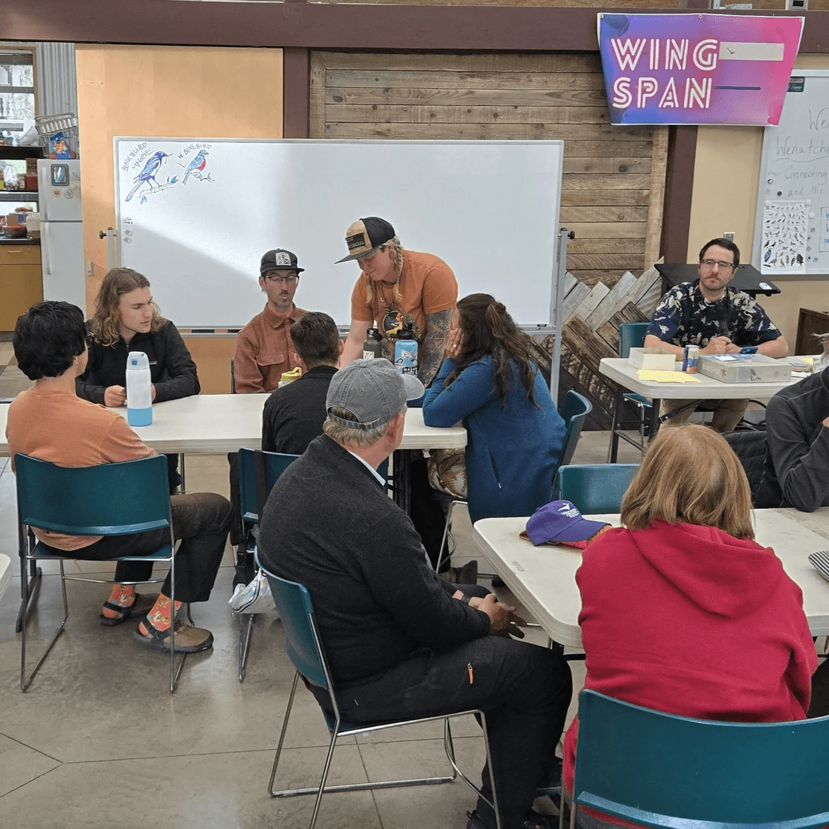 Adults in the Red Barn during the 2025 Bird Fest Happy Hour and Game Night
