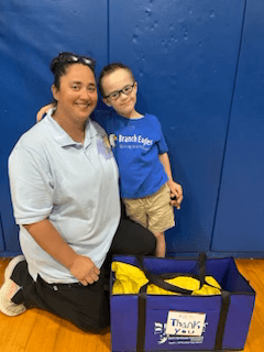 Ms. Comeaux with DSAA member Asa