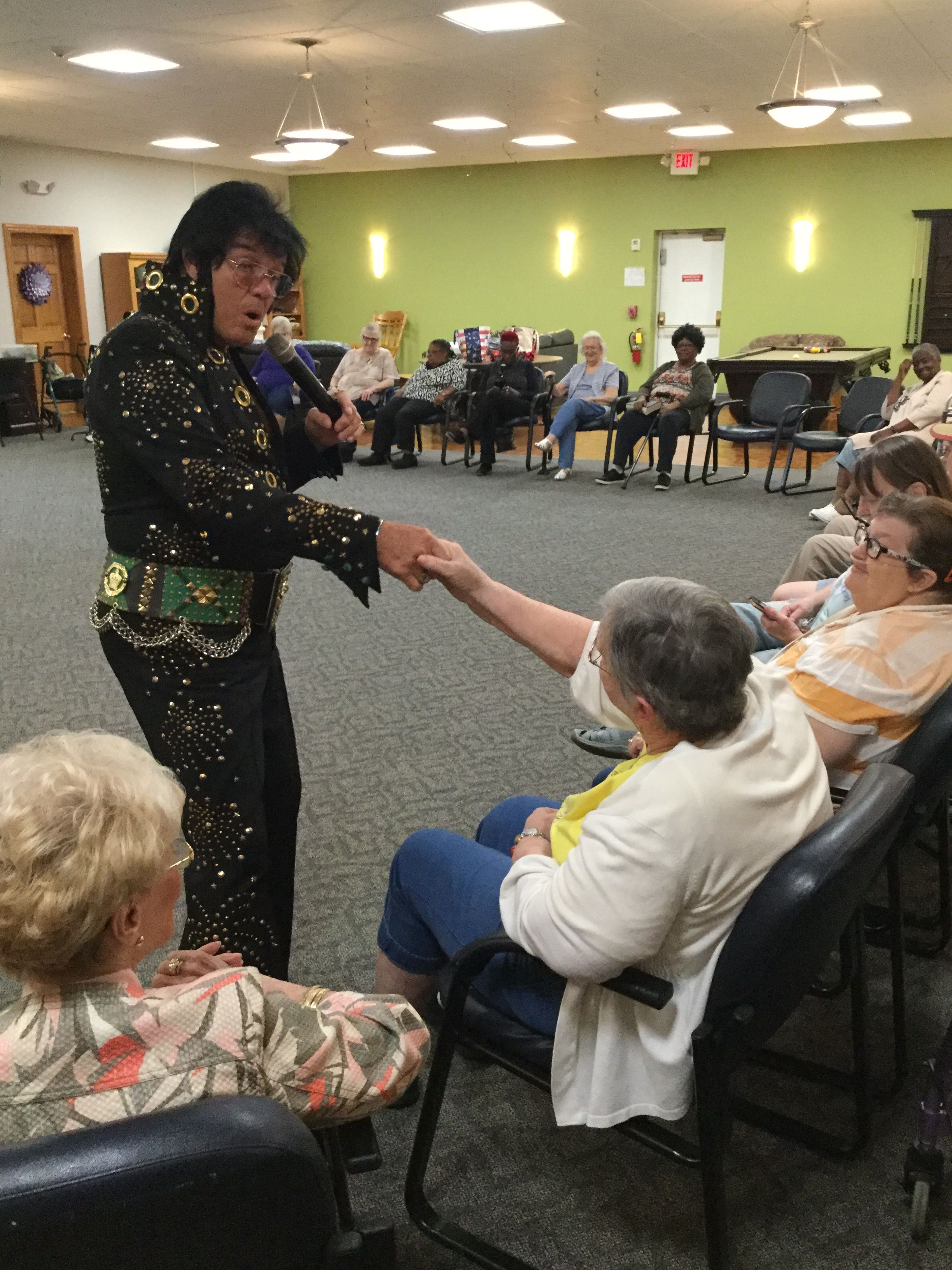 Elvis serenades our Adult Day Center member Peggy