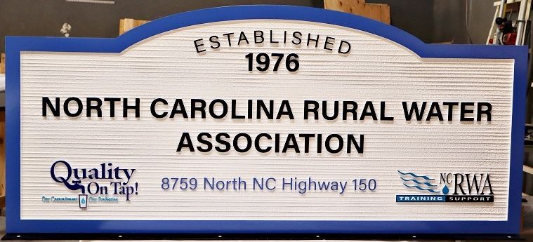 S28058 - Carved and Sandblasted HDU Entrance Address Sign for "North Carolina Rural Water Association"