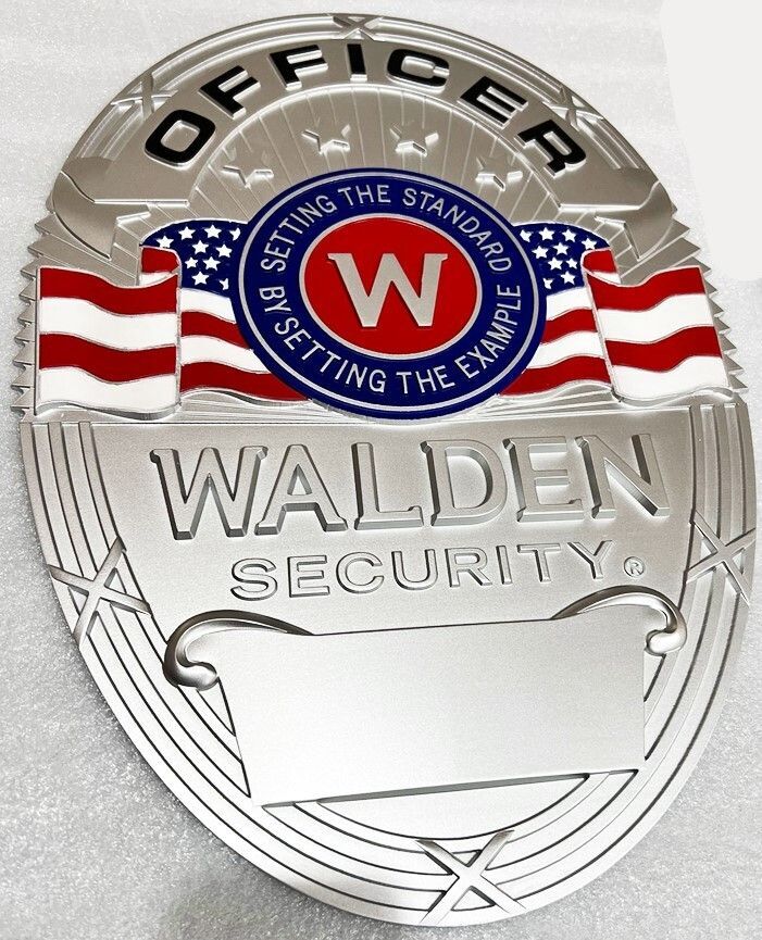 PP-1509 - Carved 3-D Bas-Relief Plaque of the Badge of a Guard of Walden Security (oblique view)