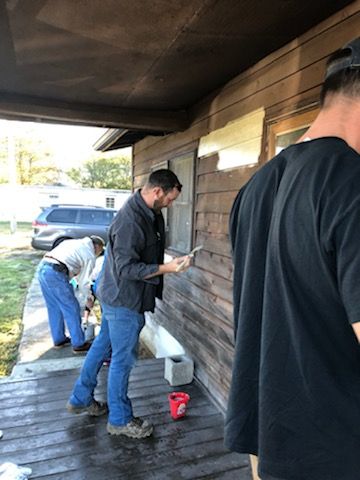  Members from the North Georgia Council of the Greater Chattanooga Association of Realtors helped us paint the exterior of a home we are currently repairing through Re-Habitat