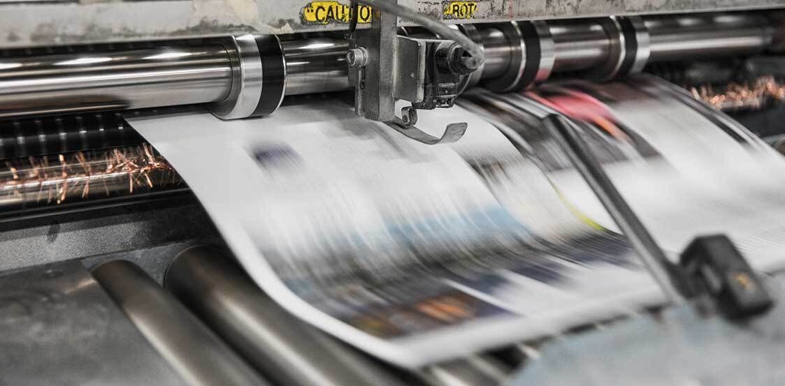 Printing press running paper