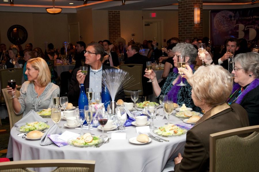 Donors raise their glasses at AWP's 35th Anniversary Dinner.