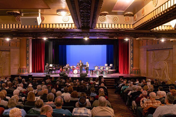 A band playing at the Missouri Theater. 