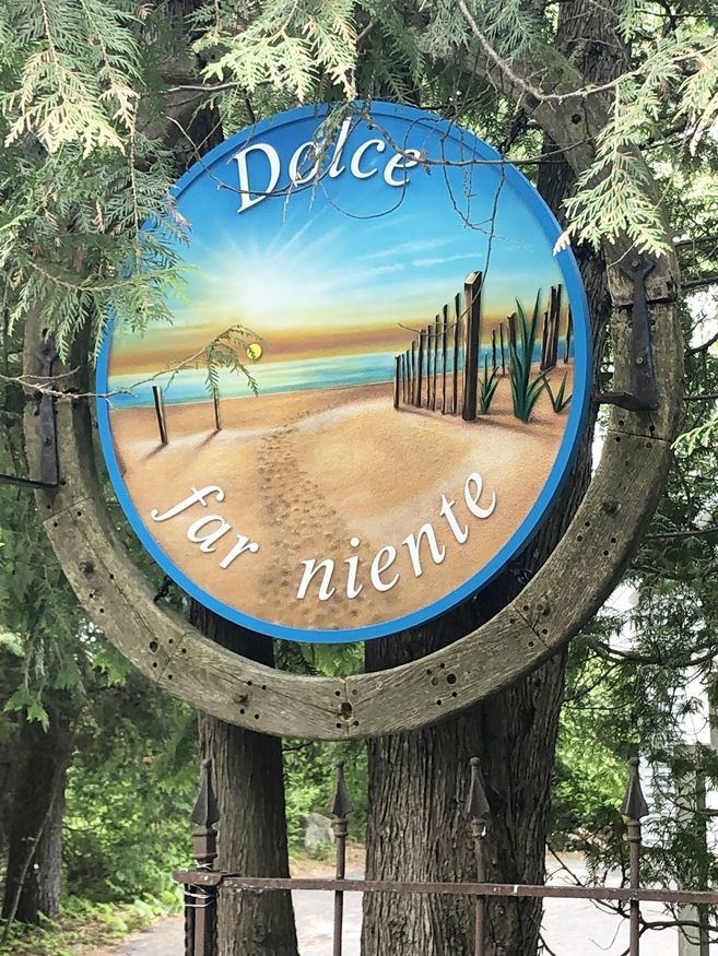 L21082 - Carved 2.5-D Raised Relief  HDU Coastal Residence Name Sign "Dolce far Niete" , with  Plants, Sand, Sea and Sunset as Artwork,  Mounted on a Tree