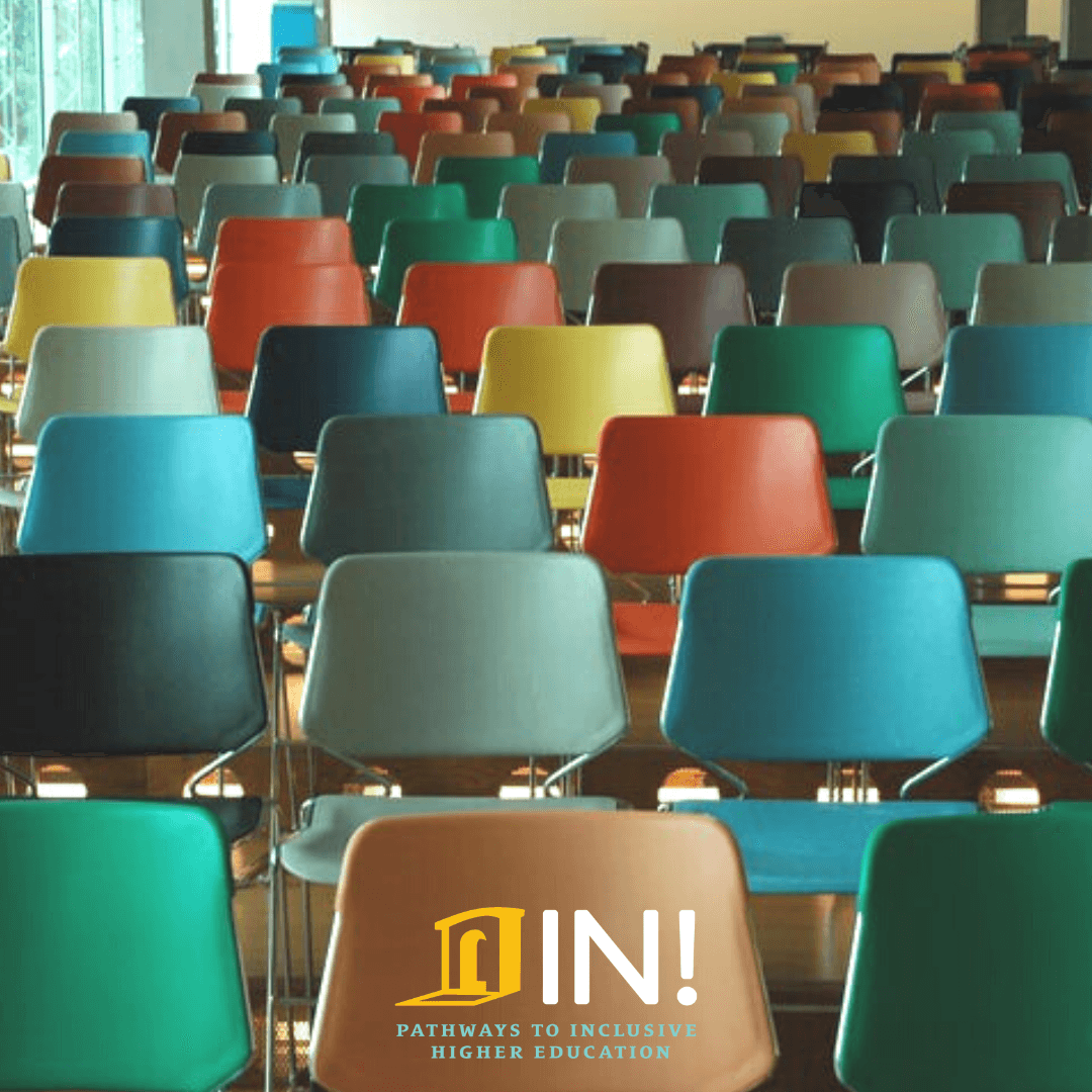 colorful chairs in college classroom with in logo 