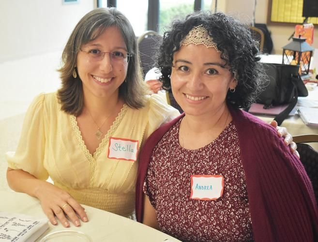 Two woman sitting at the women's encounter
